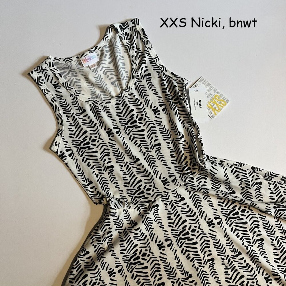 XXS Lularoe Nicki dress, white with black tribal or animal print stripes